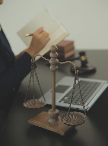 Judge,Gavel,With,Justice,Lawyers,Having,Team,Meeting,At,Law